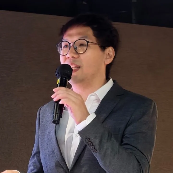 Eric Wong speaking at an event